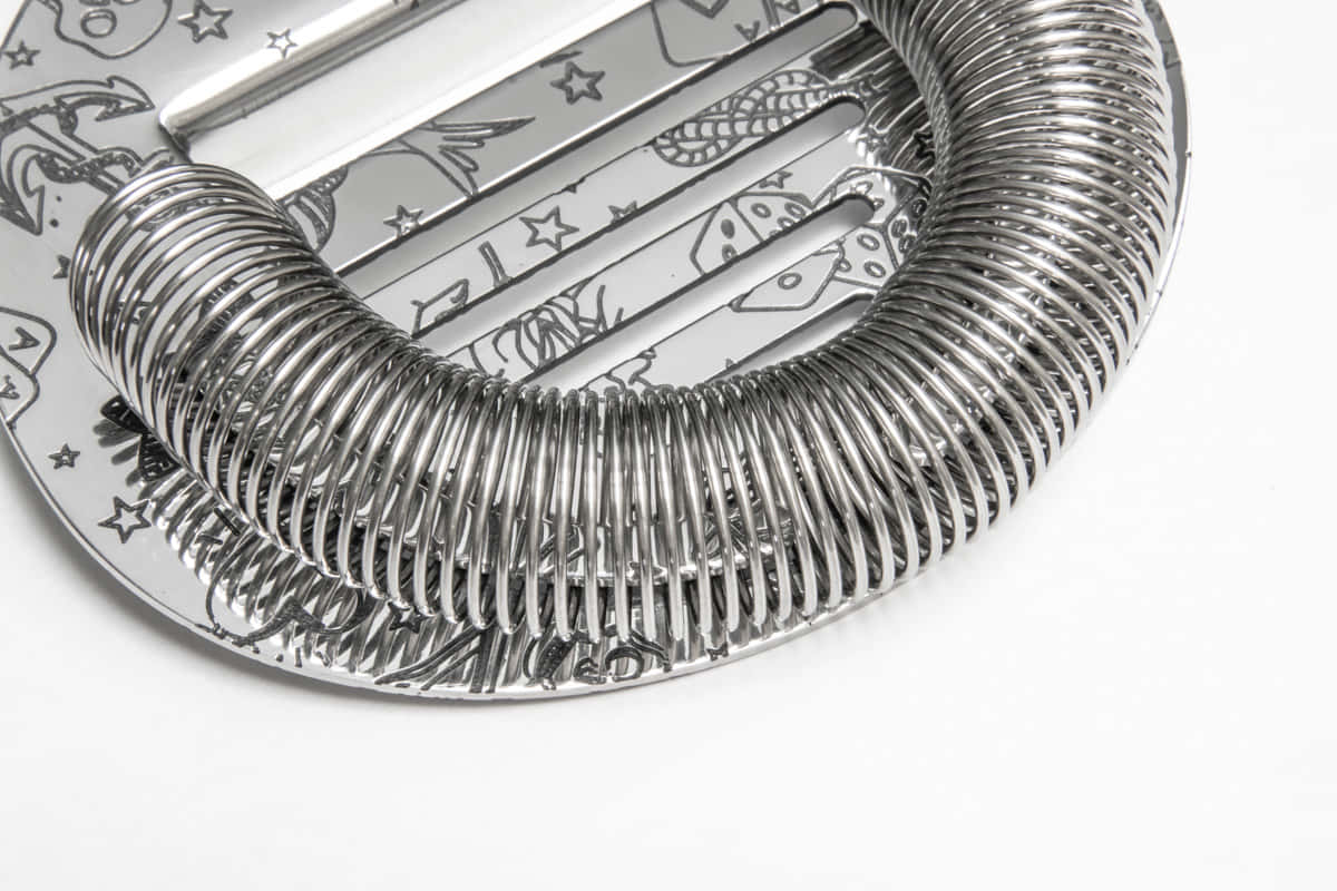 Spirale von Hawthorne Coley Strainer mit Tiki Motiven