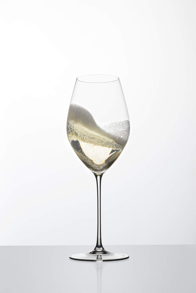 Geschwenkter Sekt in Riedel Glas Veritas Champagnerglas